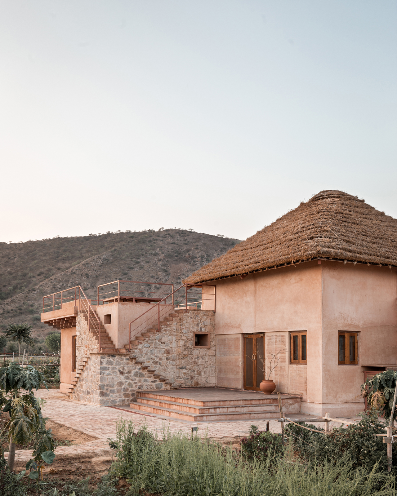 Mud House by Sketch Design Studio has a design inspired by the historic multi-story well in Rajasthan