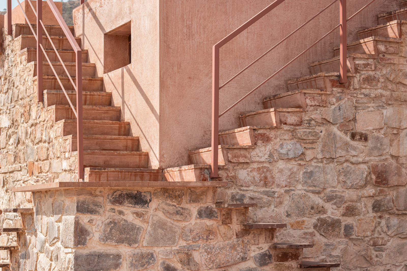 The outer staircase of this house is made of reclaimed stone