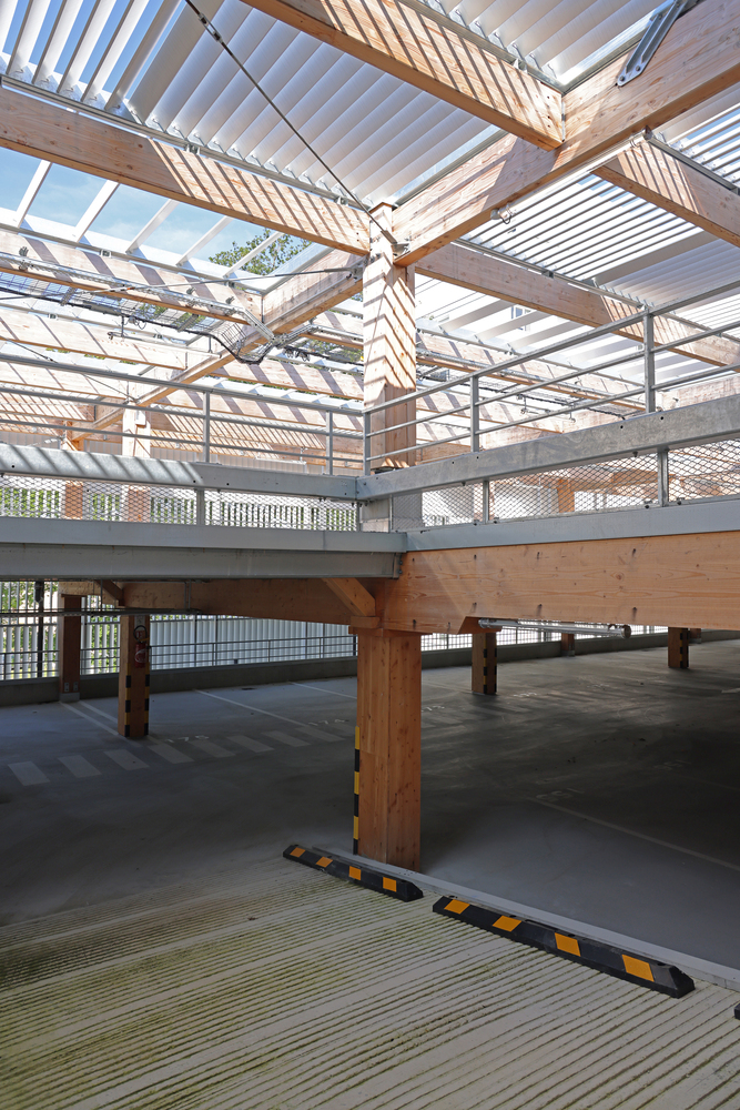 The combination of wood and concrete materials in the Treed It Car Park structure