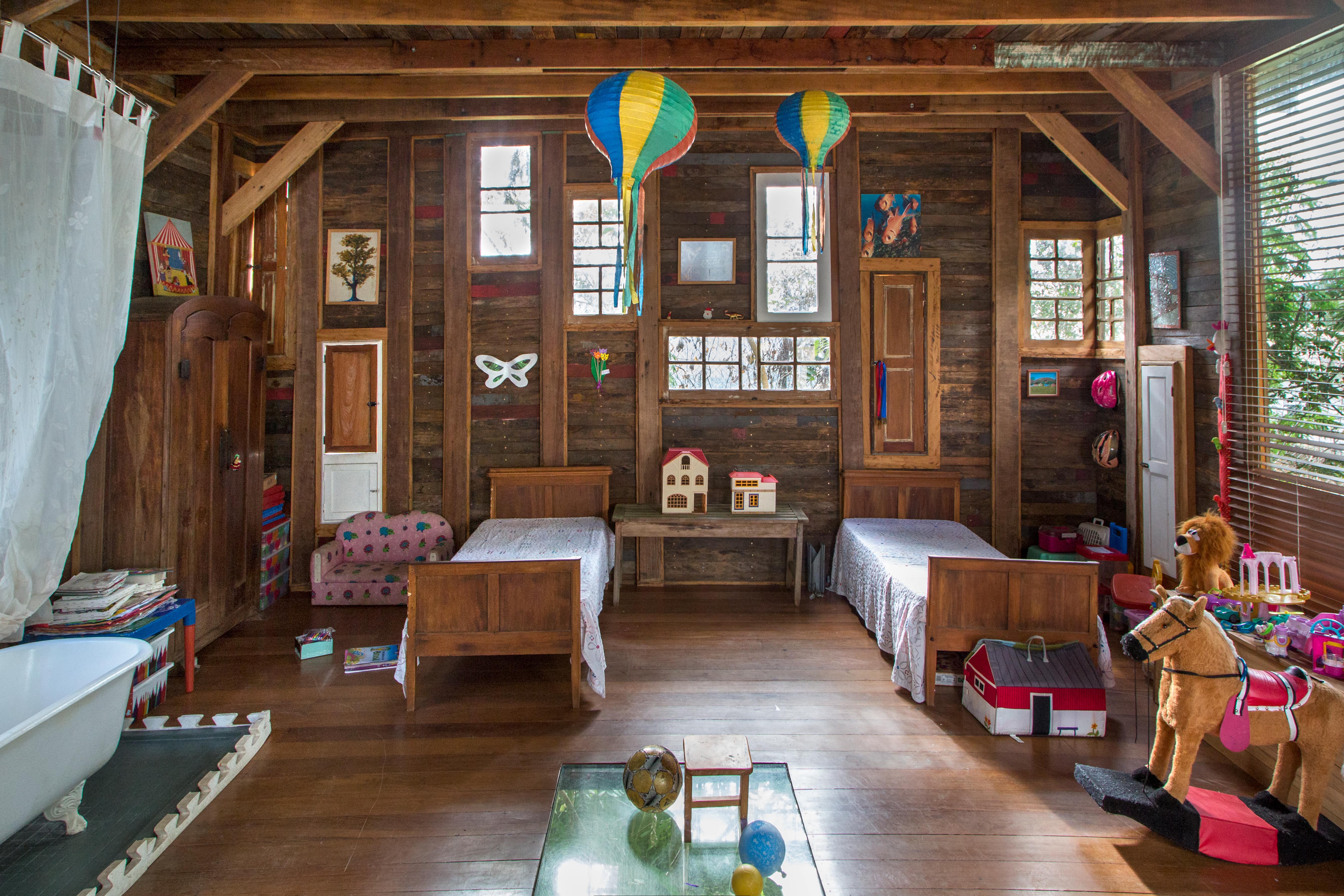 The interior of the children's room is dominated by wood material