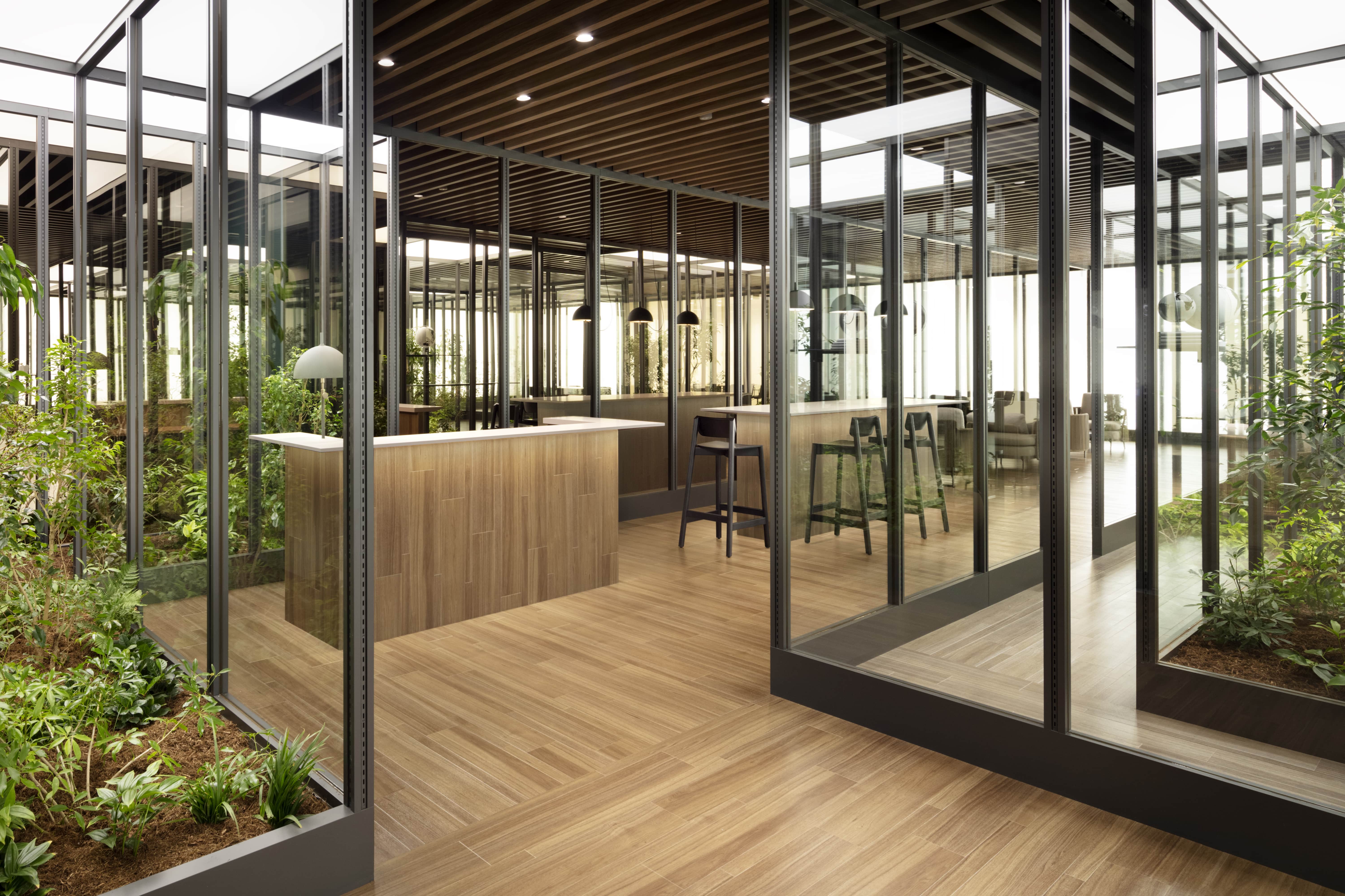 Green nature, sunlight, natural air, and wood are essential elements in building design.