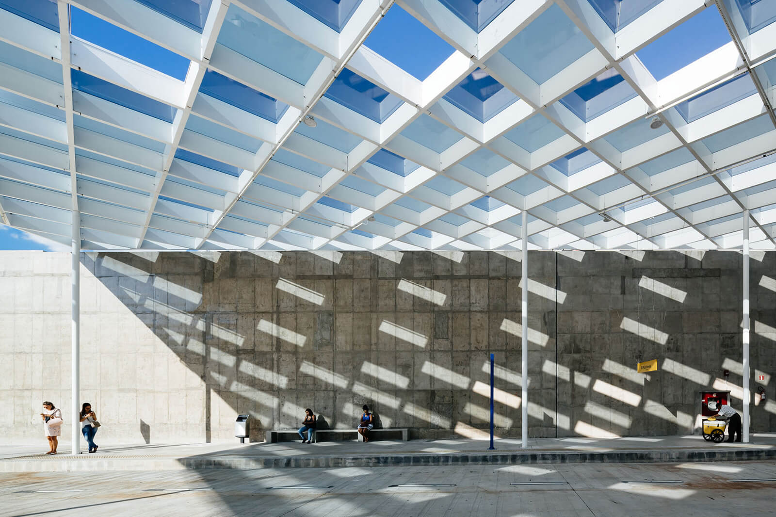 a roof structure that casts a shadow like a mosaic