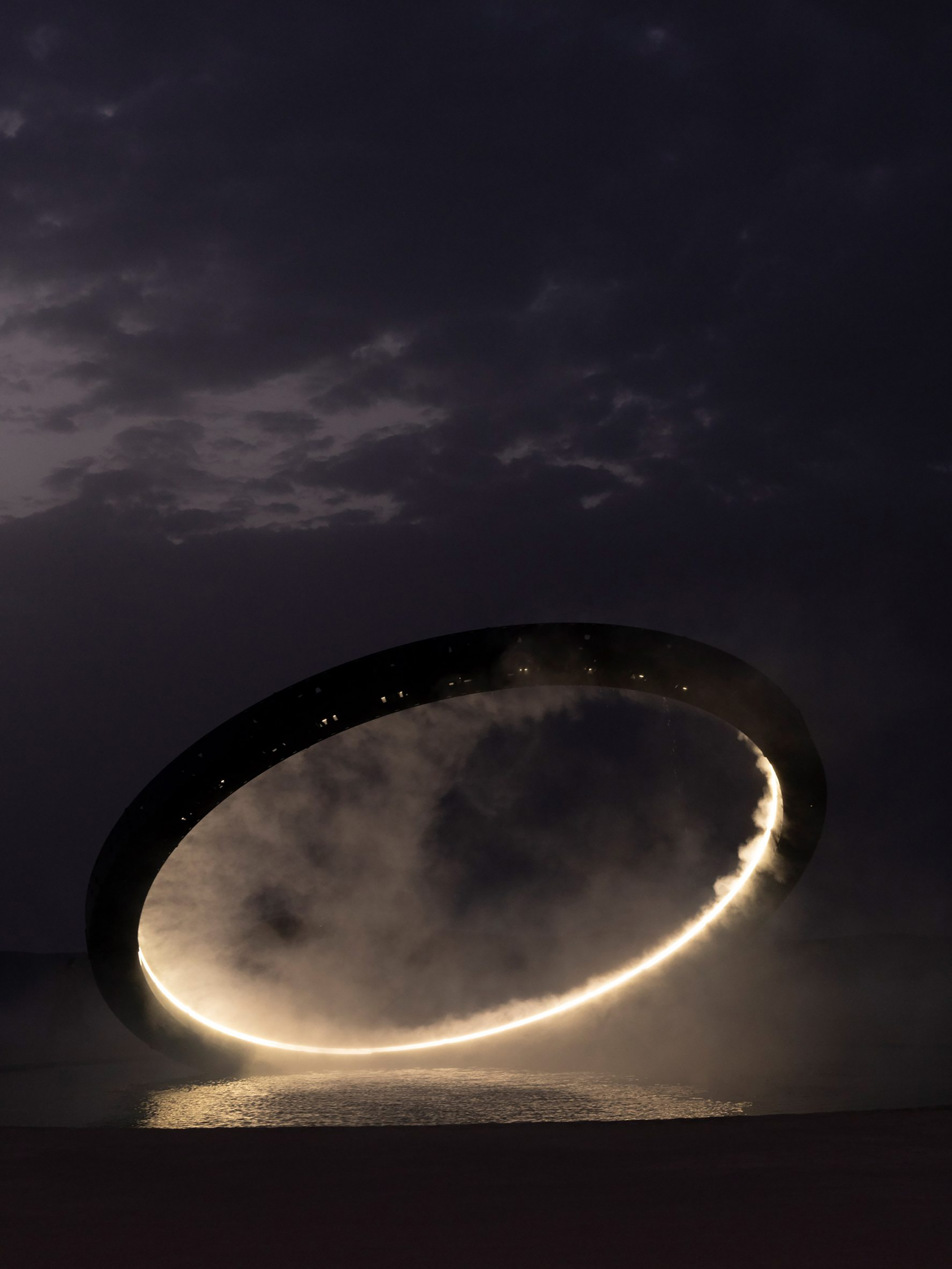 Es Devlin creates huge luminous ring for Saint Laurent's Spring Summer 2023 show