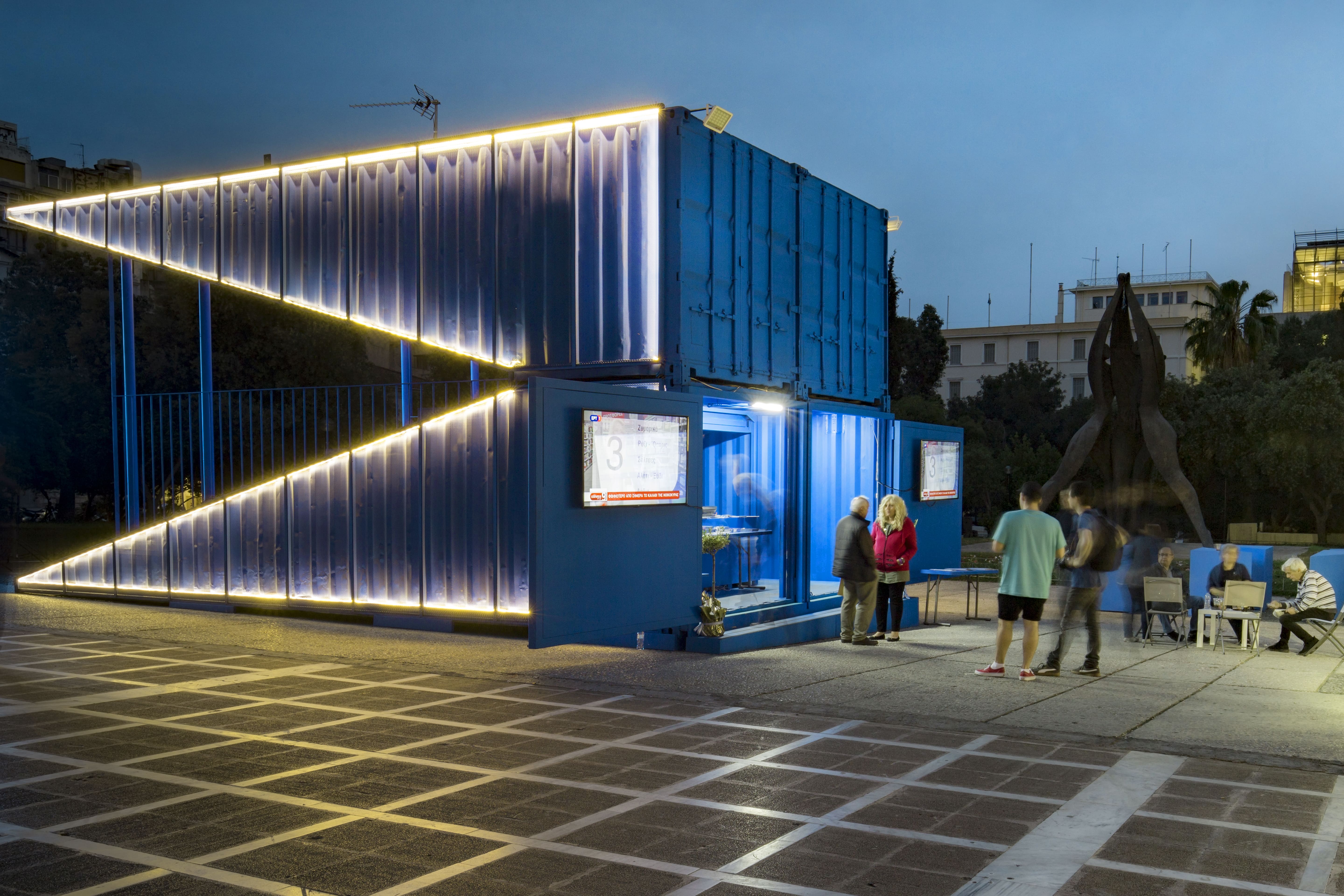 Mobile Podium structure built with two blue containers
