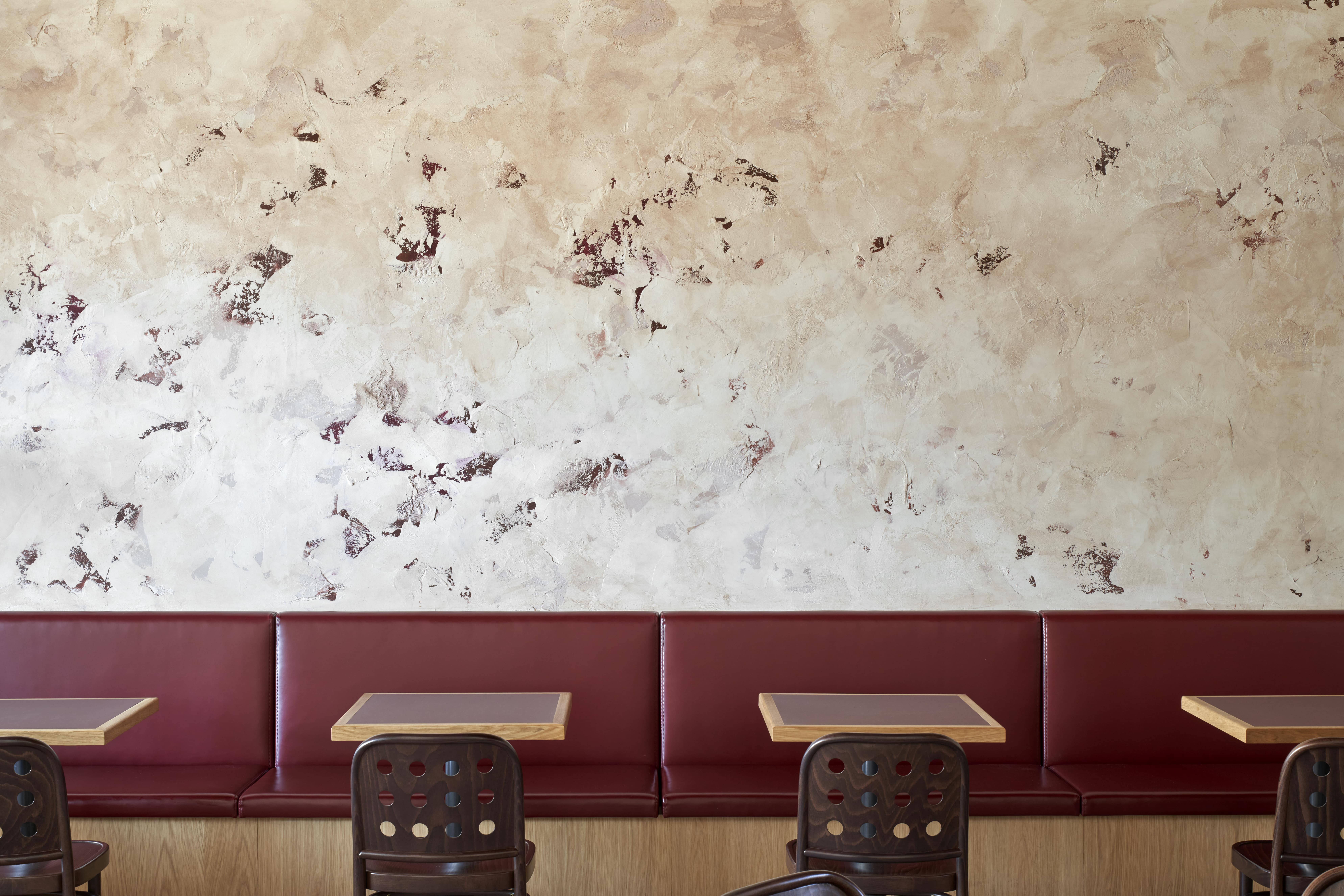 (Main dining room with abstract walls as the background)