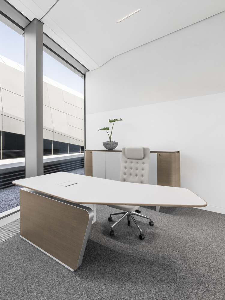 Desks and work chairs in the office are ergonomically designed