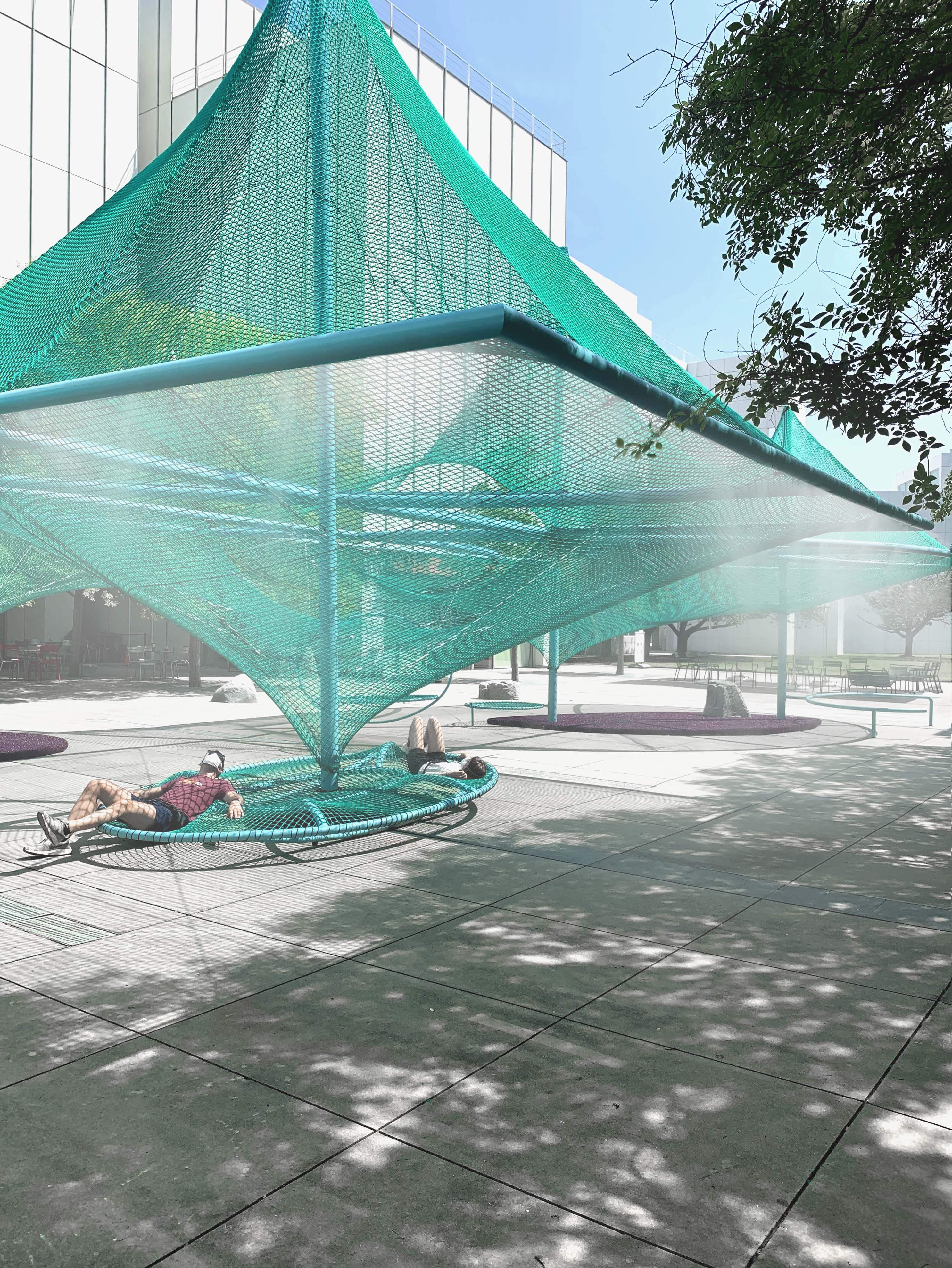 Visitors can sit, lie down, and relax under the canopy