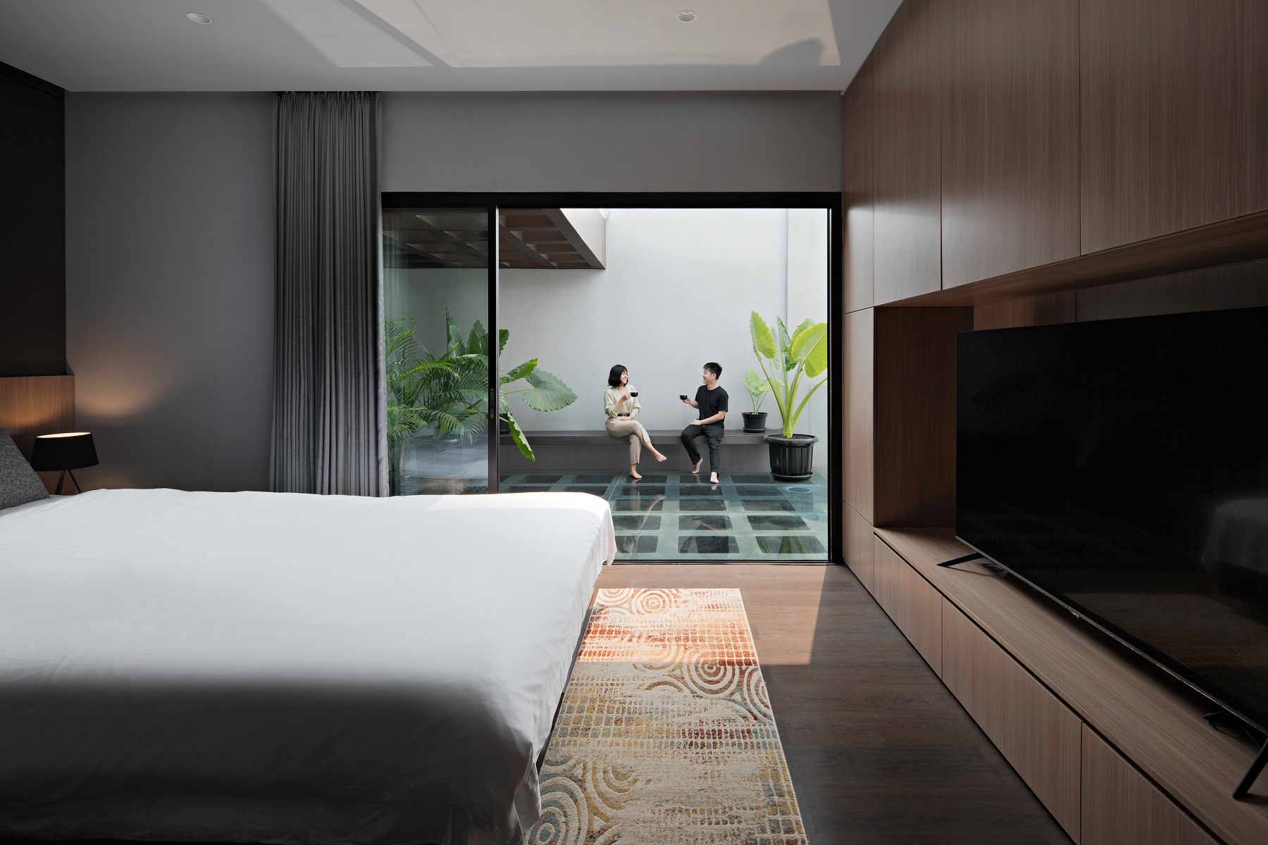 Interior view of the master bedroom RifBagus House, Photo by Mario Wibowo