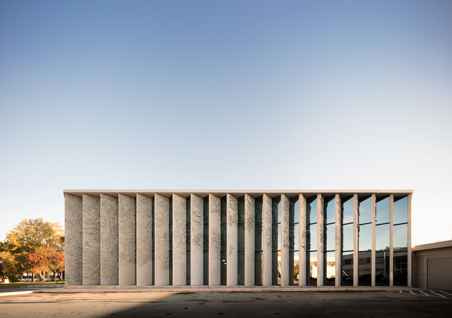A series of concrete panels make up the facade of the GS1 Portugal