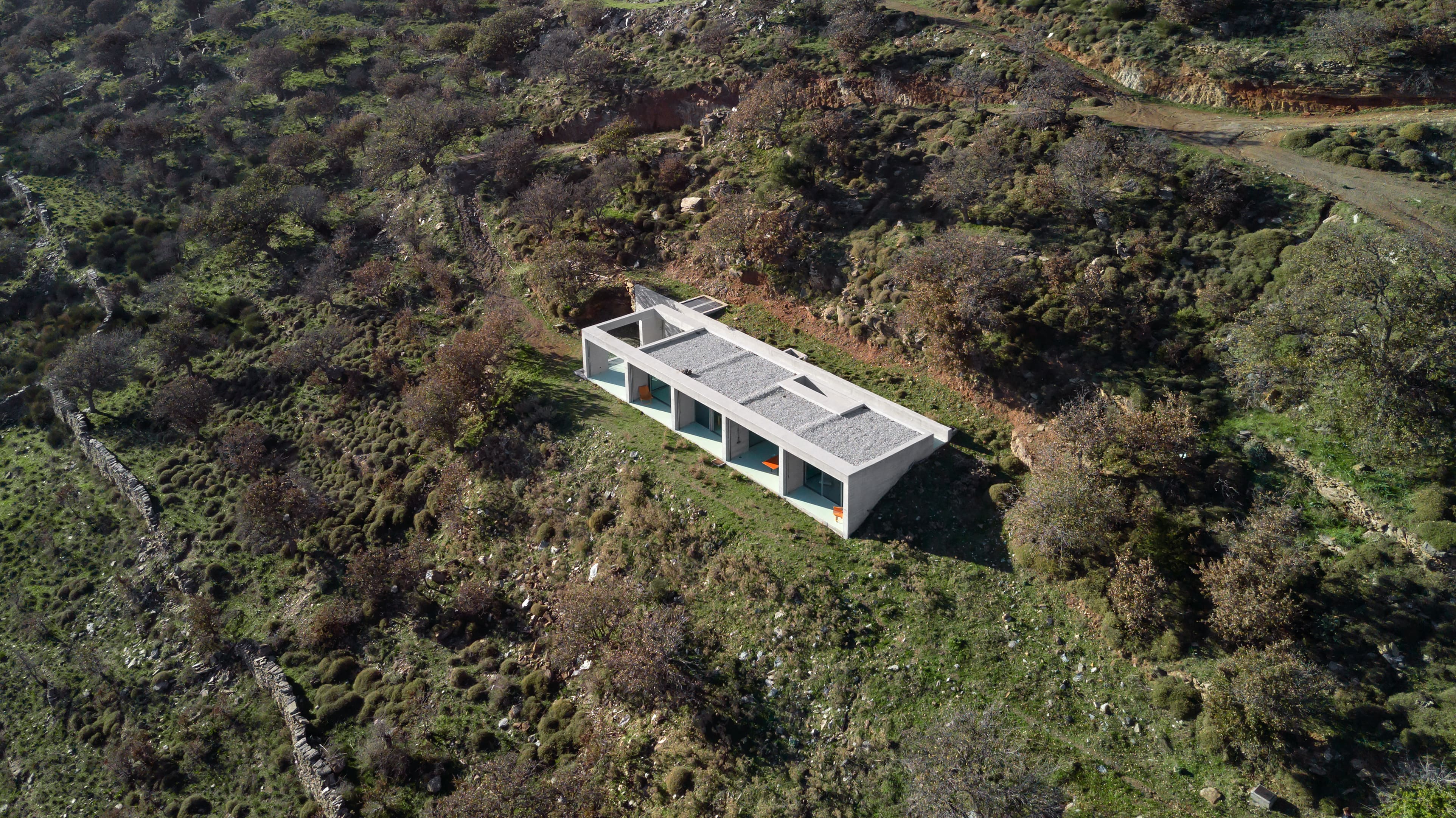 A drone view from a Parallel House shows the topography it occupies