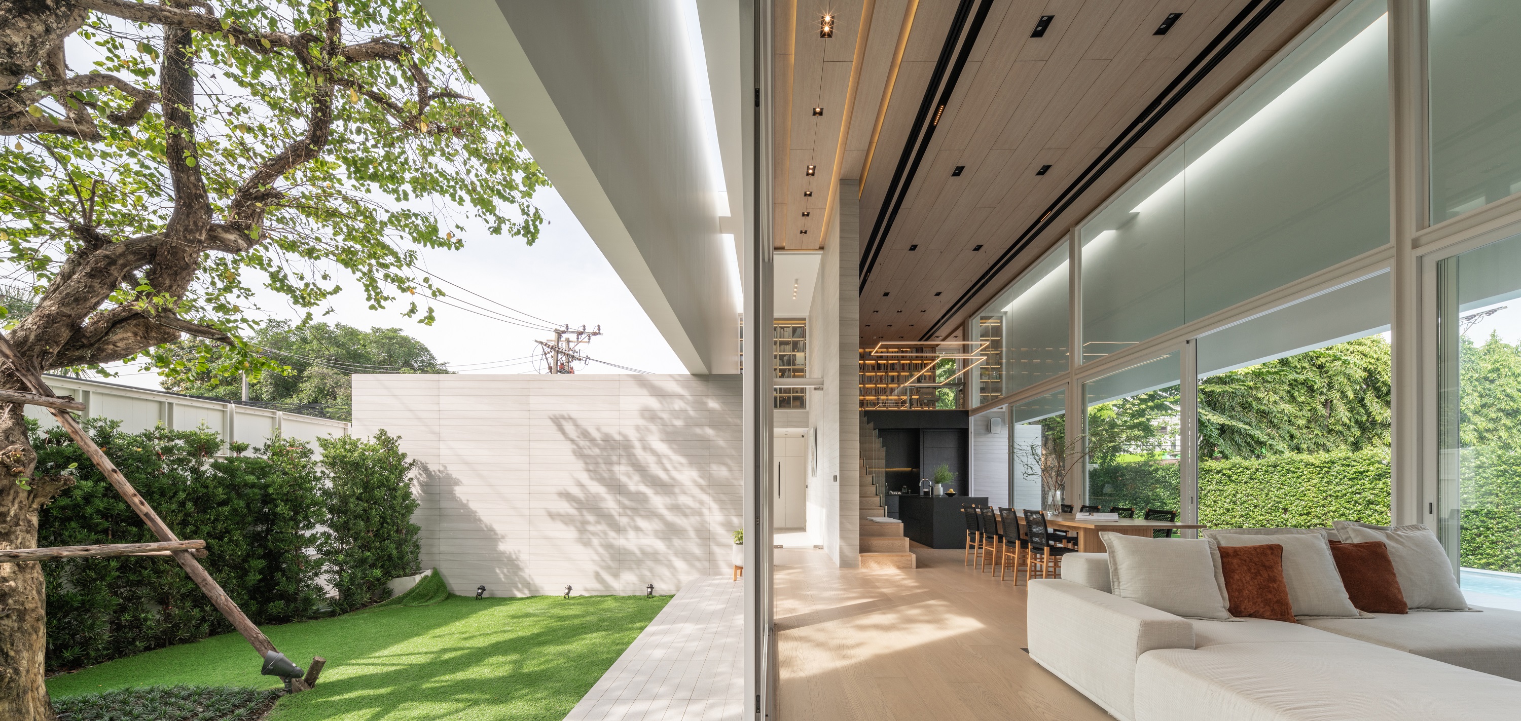 Courtyard and interior area view of TJ House, Photo by SkyGround architectural film & photography
