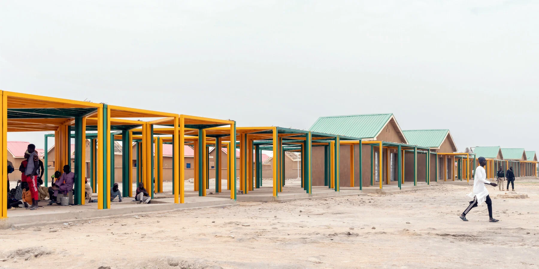 An covered pavilion that can be used for various activities in the center of the village